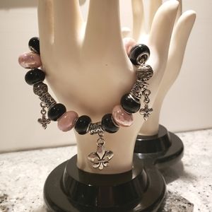 Fleur-de-lis bracelet.